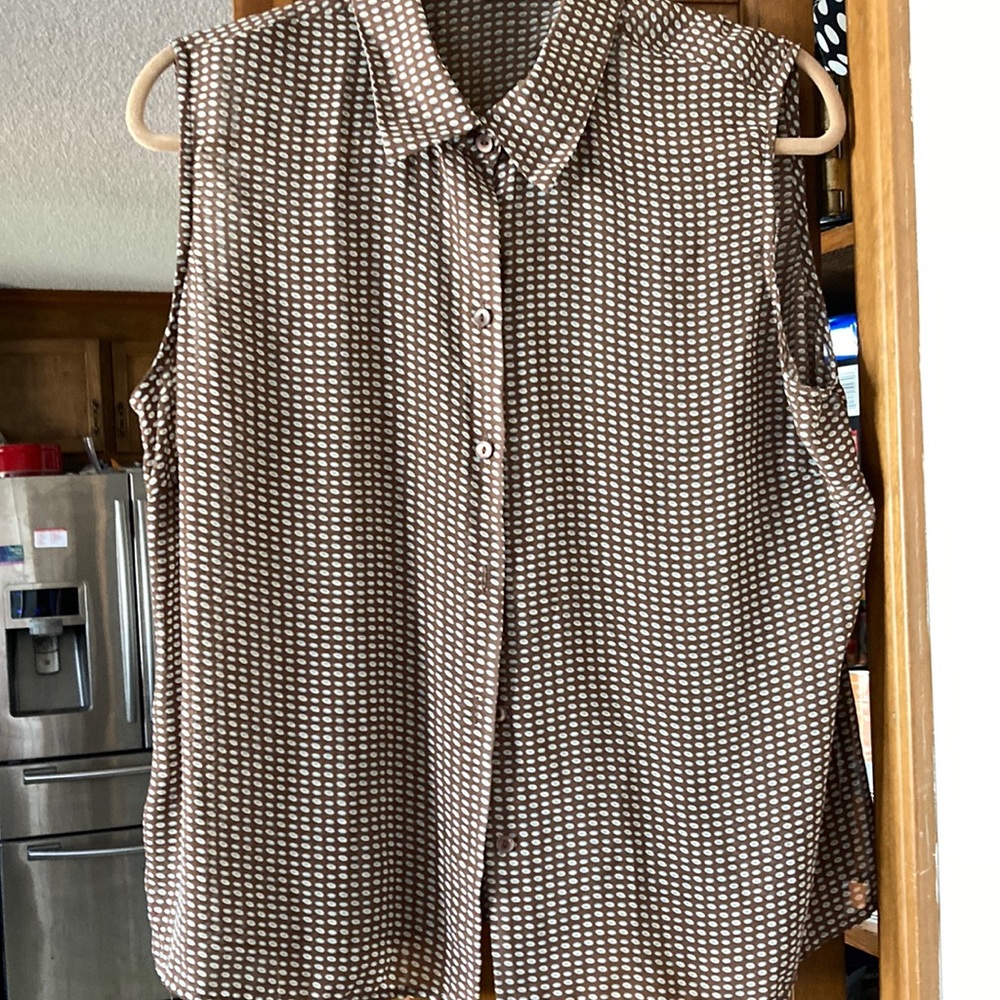Sheer, sleeveless blouse